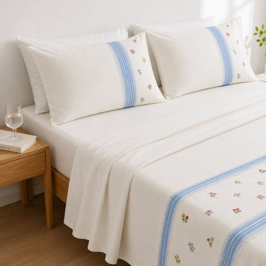 Elegant White Bedsheet Set with Blue Striped Borders & Delicate Floral Embroidery